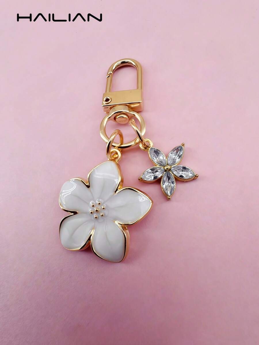 Travel Accessories Gifts For Women - Lightweight elegant sakura-shaped alloy keychain for